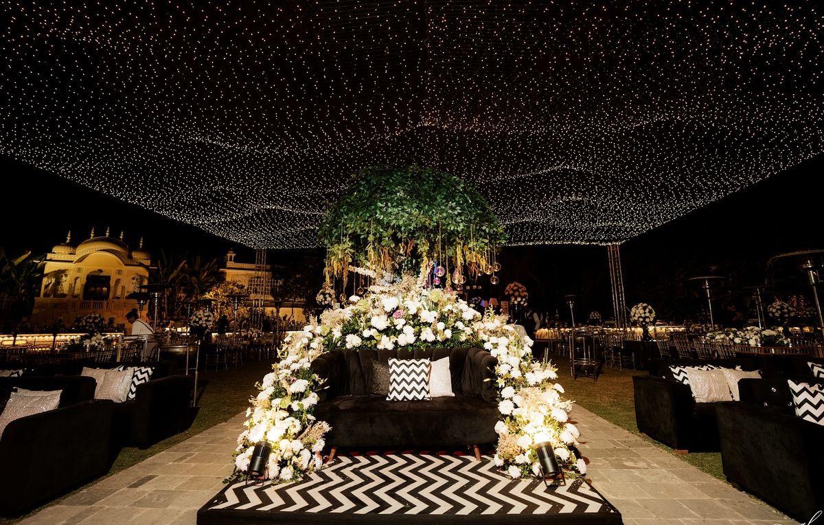 Bride and groom sitting design by Nagar Events